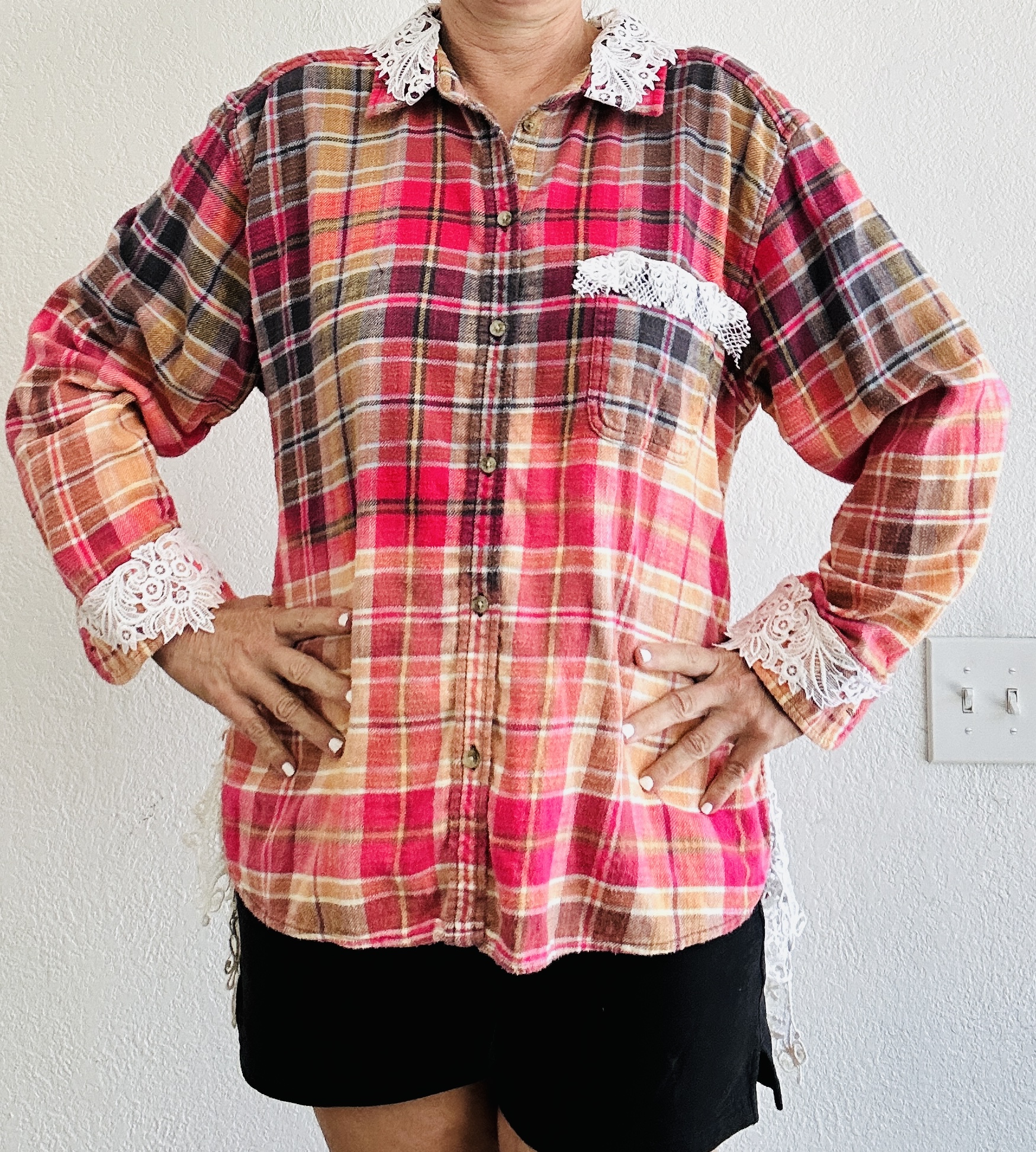 Upcycled KISS band flannel featuring 2004 Rock the Nation World Tour graphic, vibrant pink hand-bleached ombré, and wide ornate white lace hem.